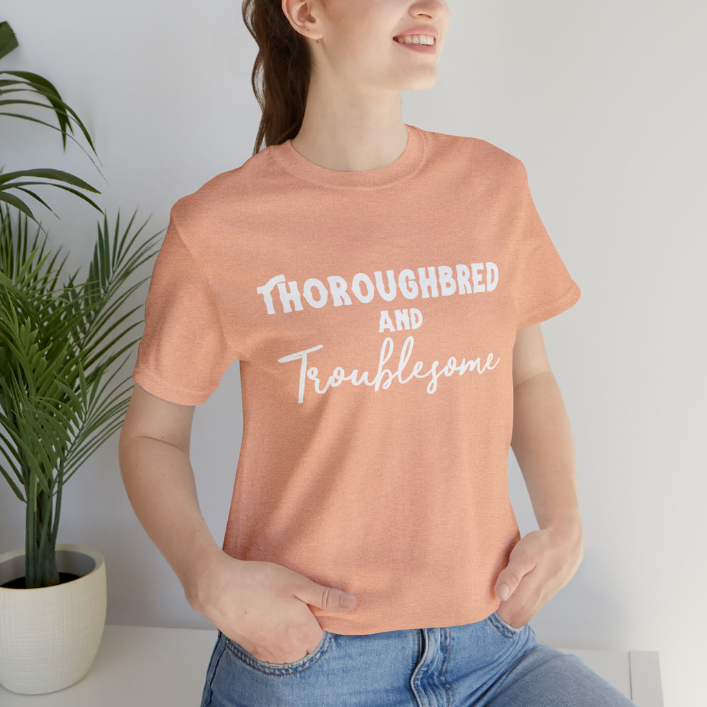 Thoroughbred & Troublesome Short Sleeve Tee Horse Color Shirt Printify Heather Peach XS 