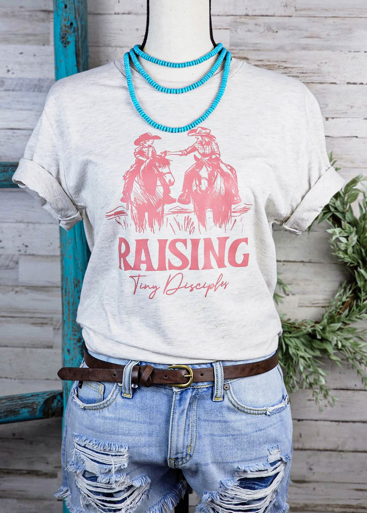 Heather Natural Raising Tiny Disciples Graphic Tee tcc graphic tee The Cinchy Cowgirl