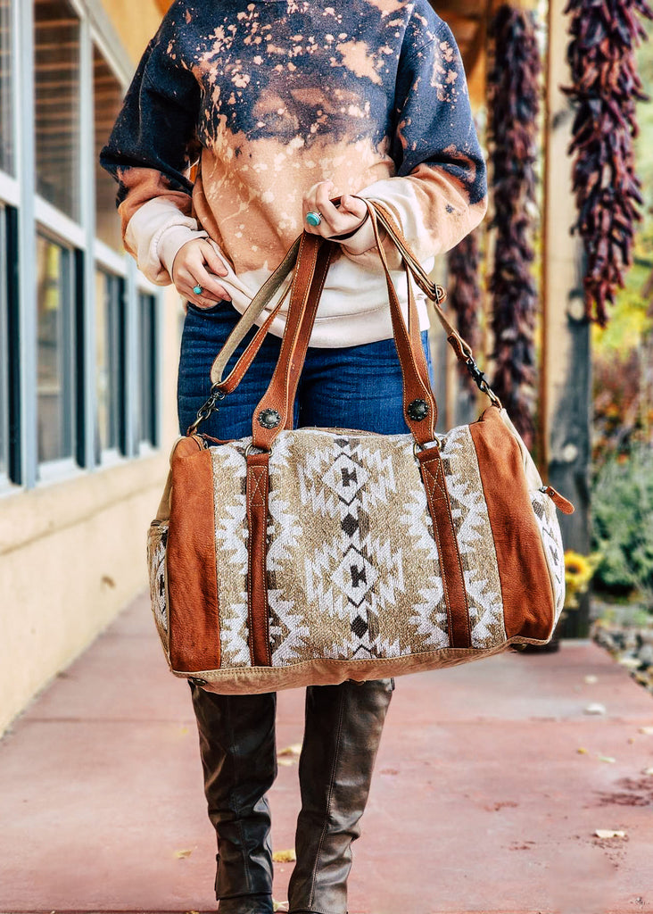 Brown Cowhide & Buckle Duffle Bag – The Cinchy Cowgirl